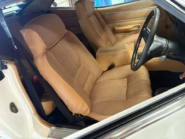 ex-NSW Police Highway patrol car (1978 XC hardtop fairmont GS) interior front seats after being repaired, reconditioned, rebuilt, retrimmed and upgraded with new reproduction Houndstooth cloth fabric as per factory original trim.